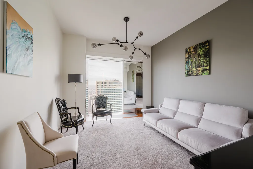 Frame from a high-rise apartment with a downtown panorama