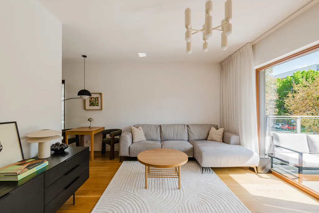 Frame from an apartment with a balcony and large plants