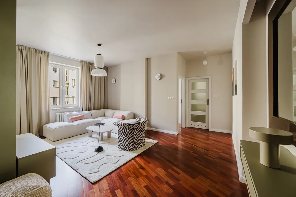 Frame from an apartment in sage tones with parquet