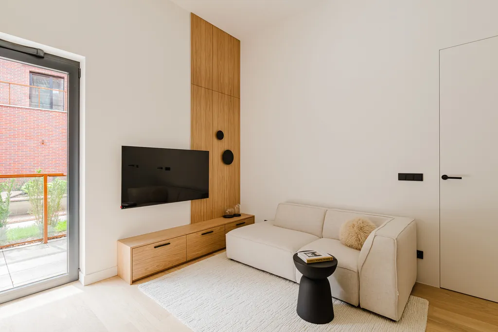 Frame from a compact apartment with oak veneer