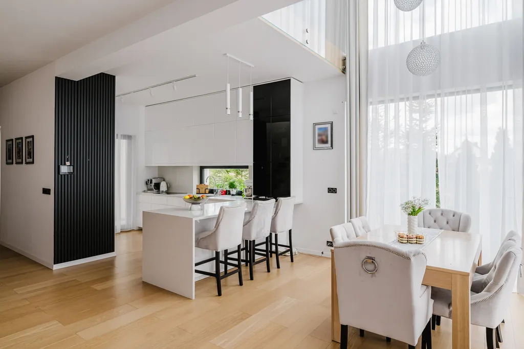 Frame from a white double-height house