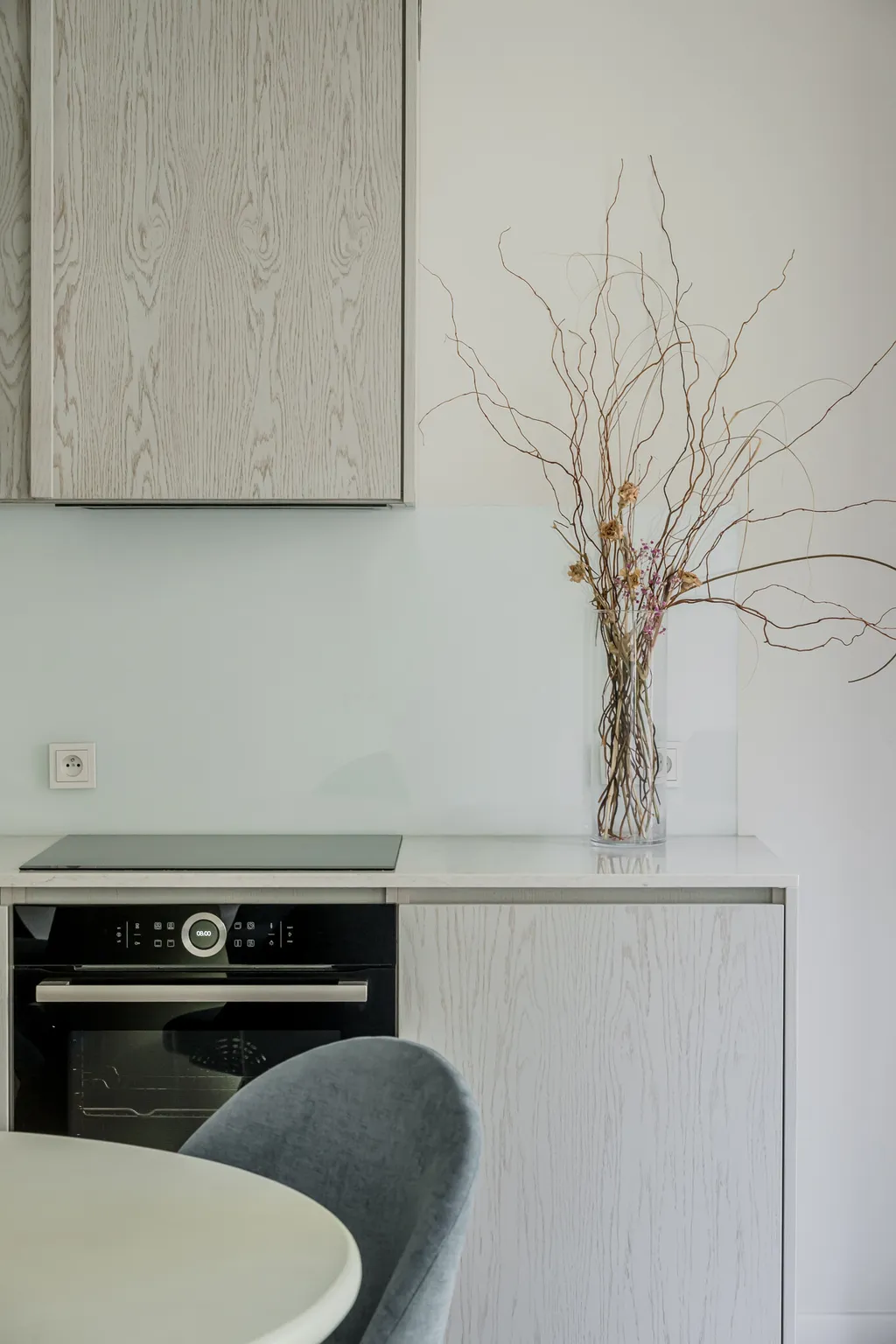 Detail from a calm apartment in pale oak