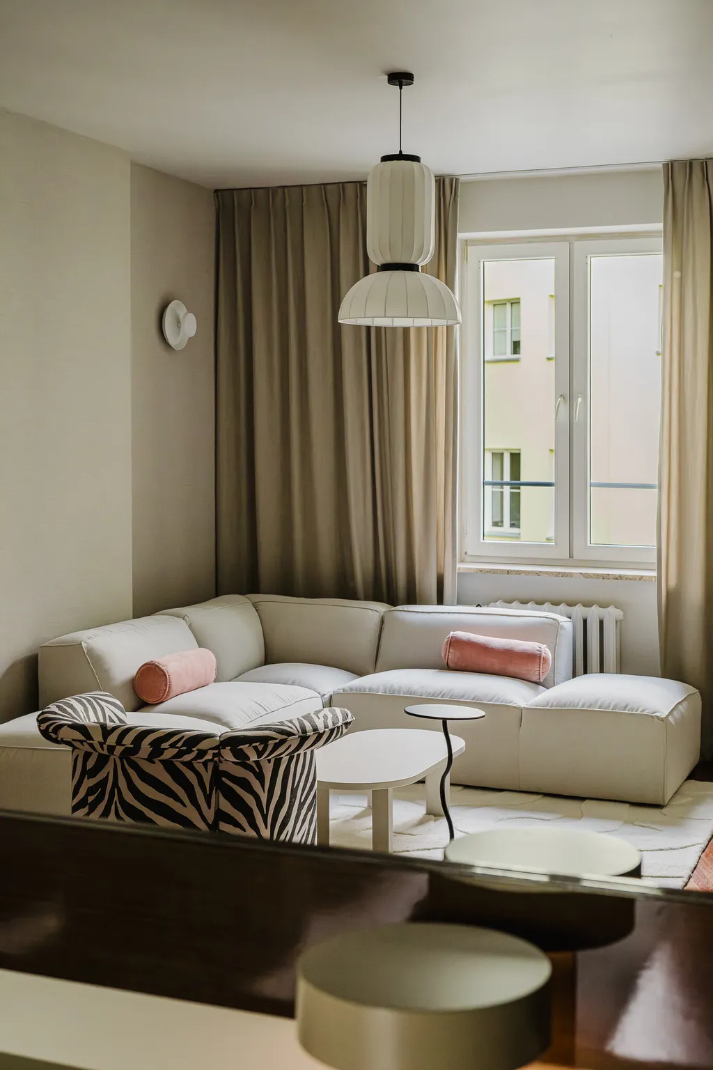Frame from an apartment in sage tones with parquet