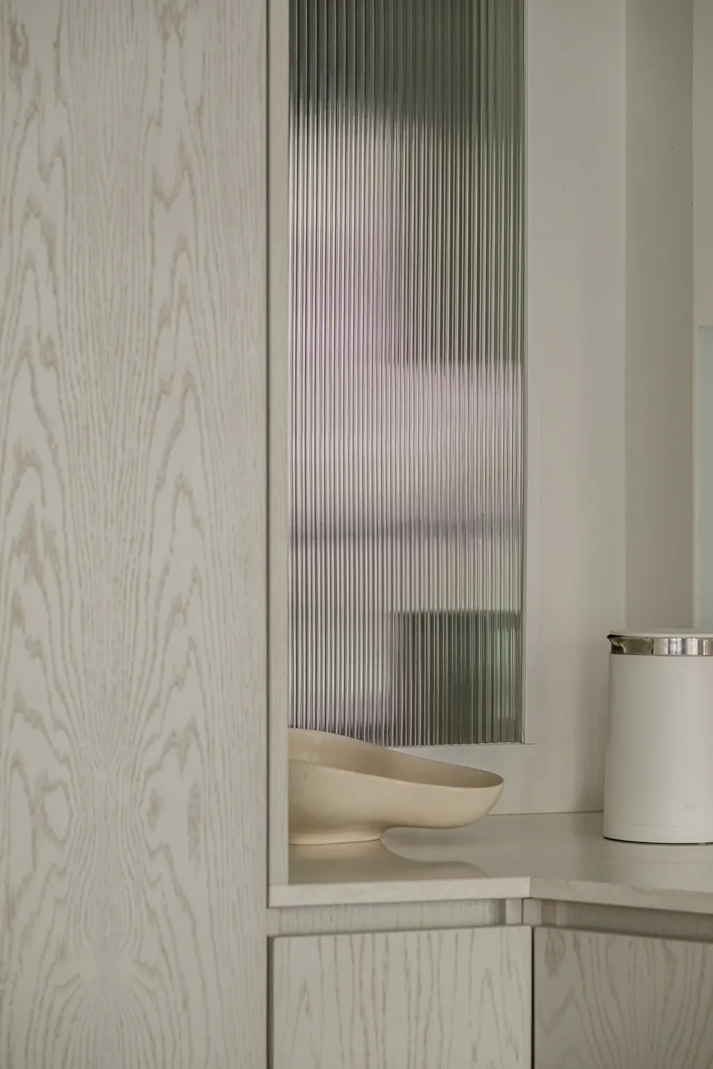 Detail from a calm apartment in pale oak