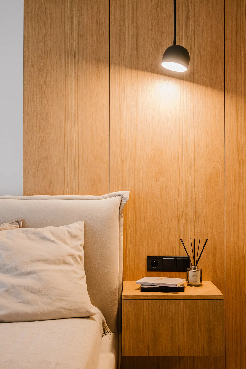 Detail from a compact apartment with oak veneer