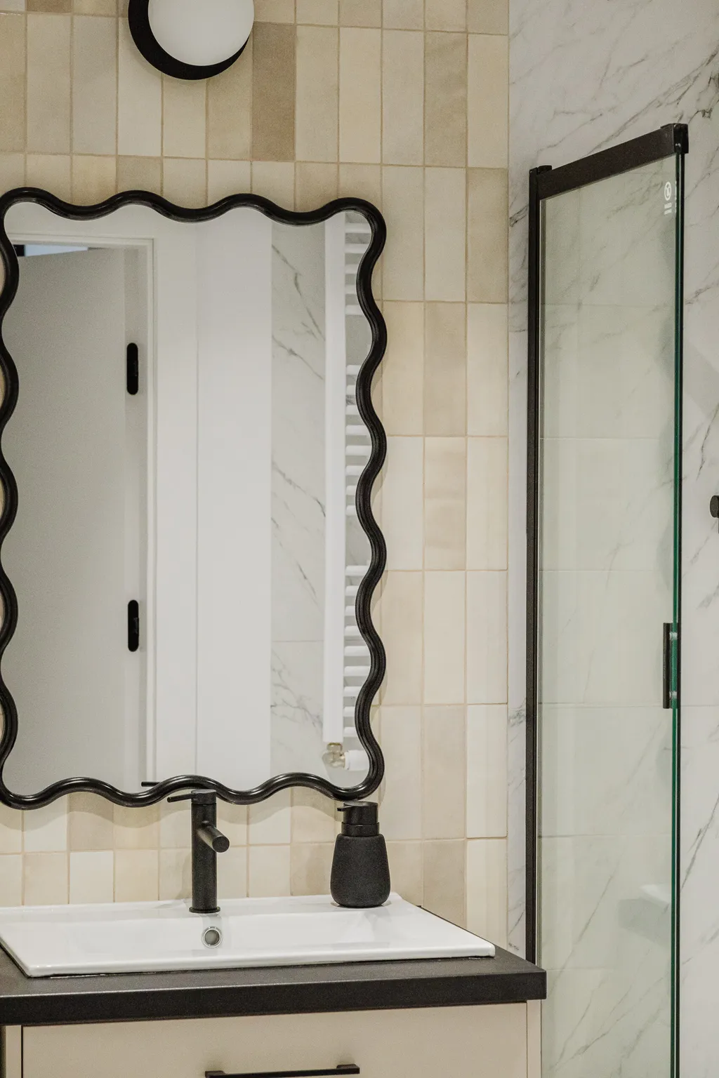 Detail from a bright apartment with wavy mirrors