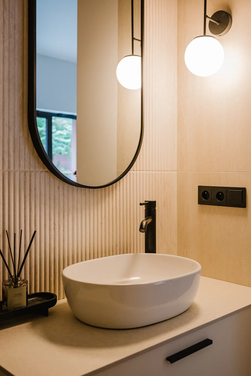 Detail from a compact apartment with oak veneer
