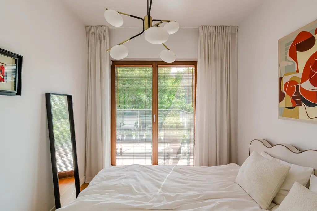 Frame from an apartment with a balcony and large plants