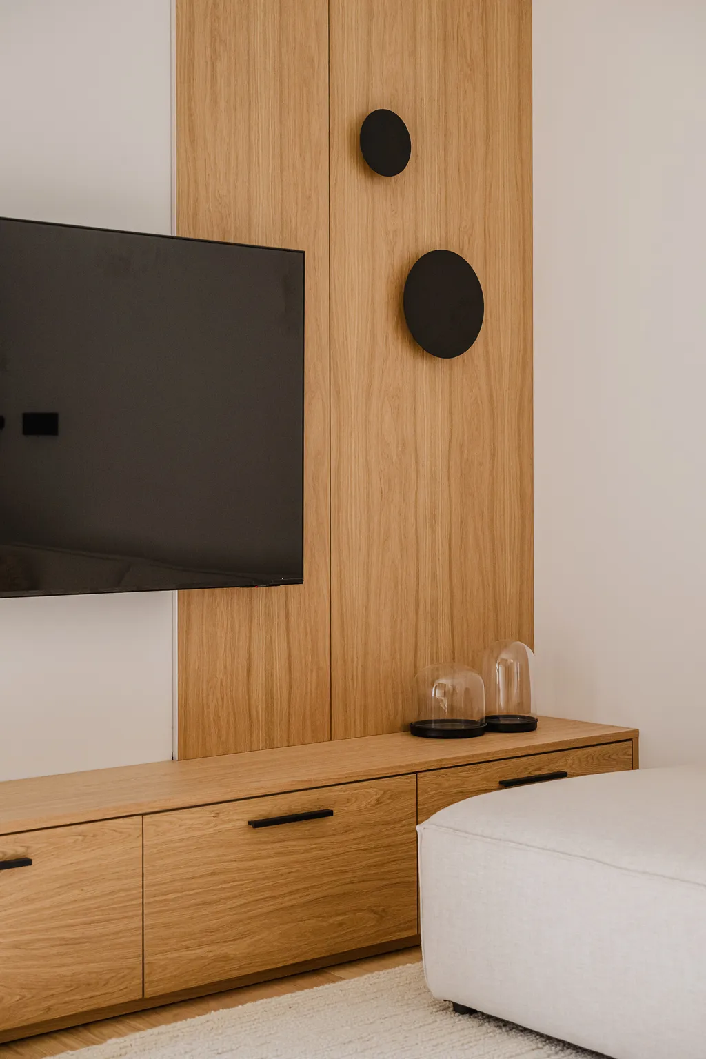Detail from a compact apartment with oak veneer